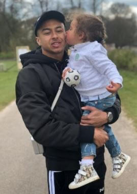 Jesse Lingard with his daughter at Tatton Park.